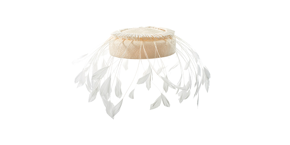 Pillbox with feathers