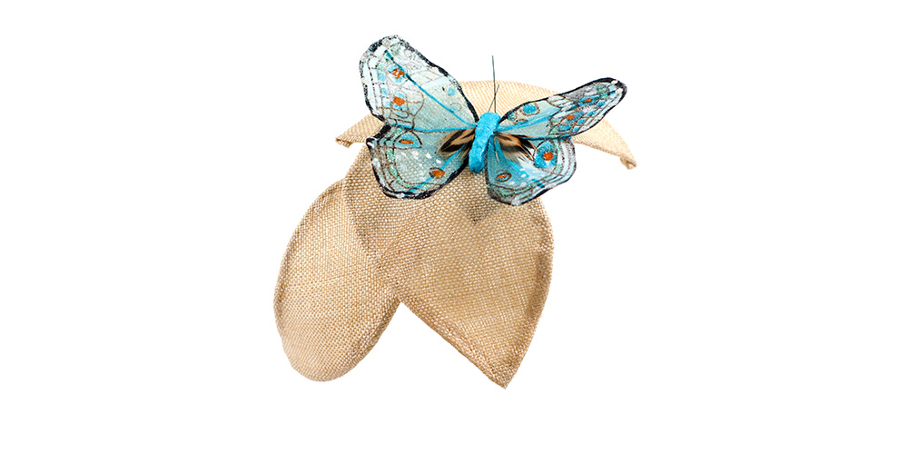 Blätterclip mit großem Schmetterling