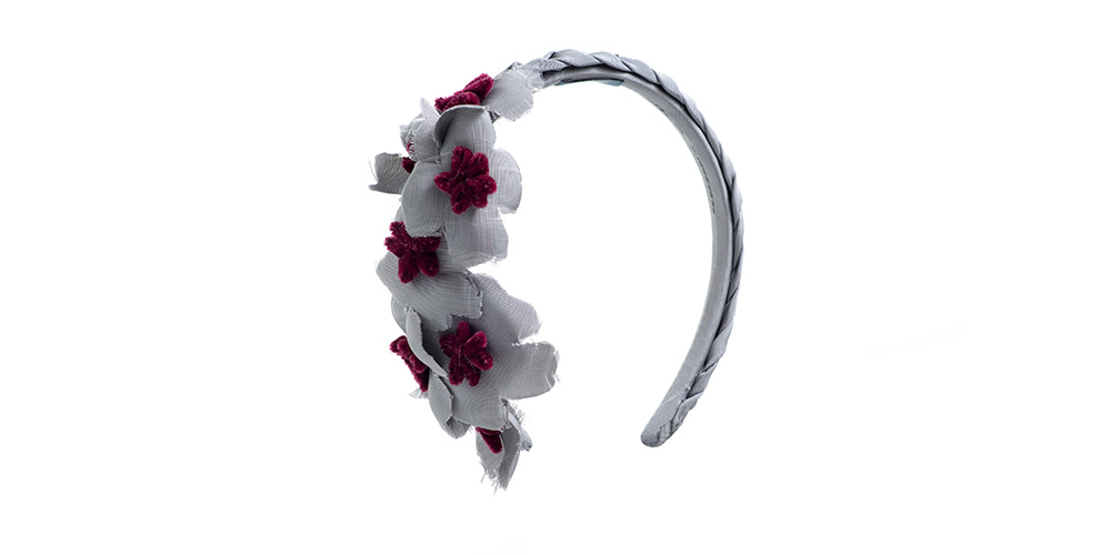 Braided light grey headband with flowers on the side